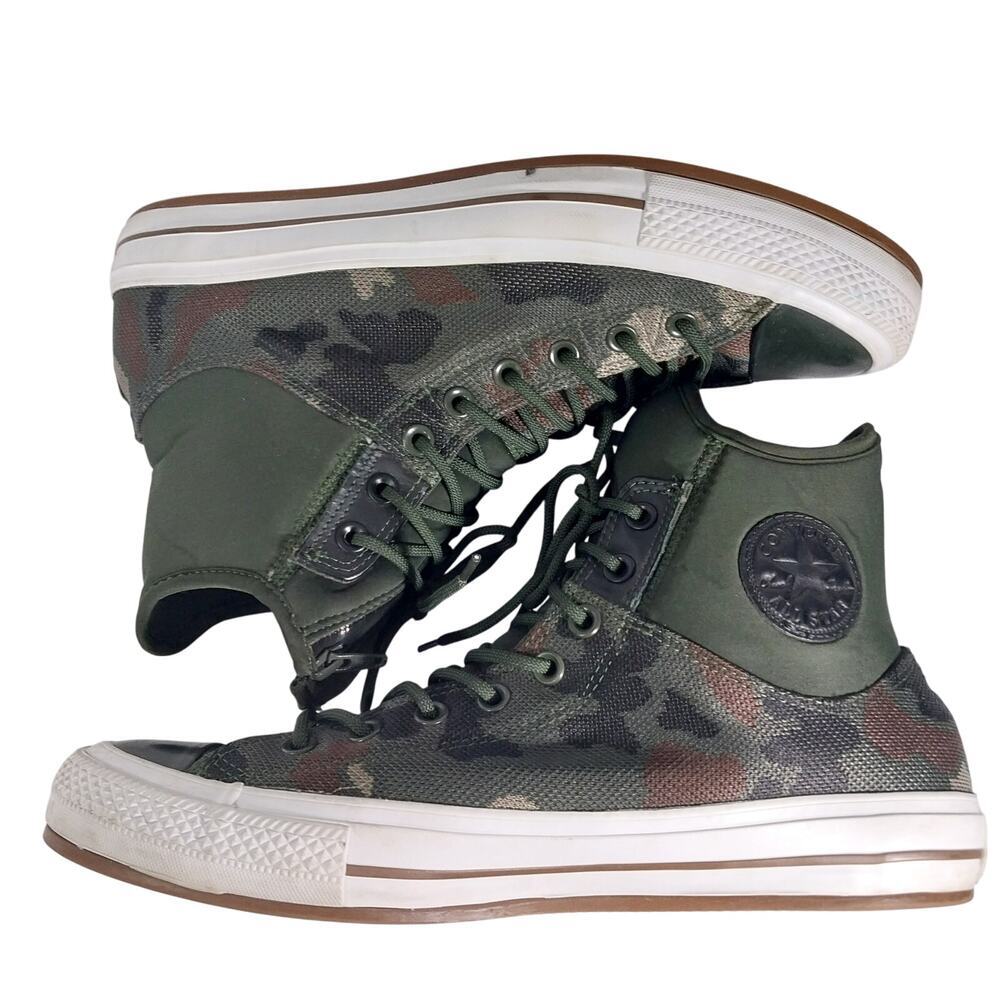 Converse High Top Sneakers in Olive Camo zipper. Very good condition
